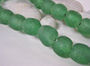 Green Glass Beads on Linen