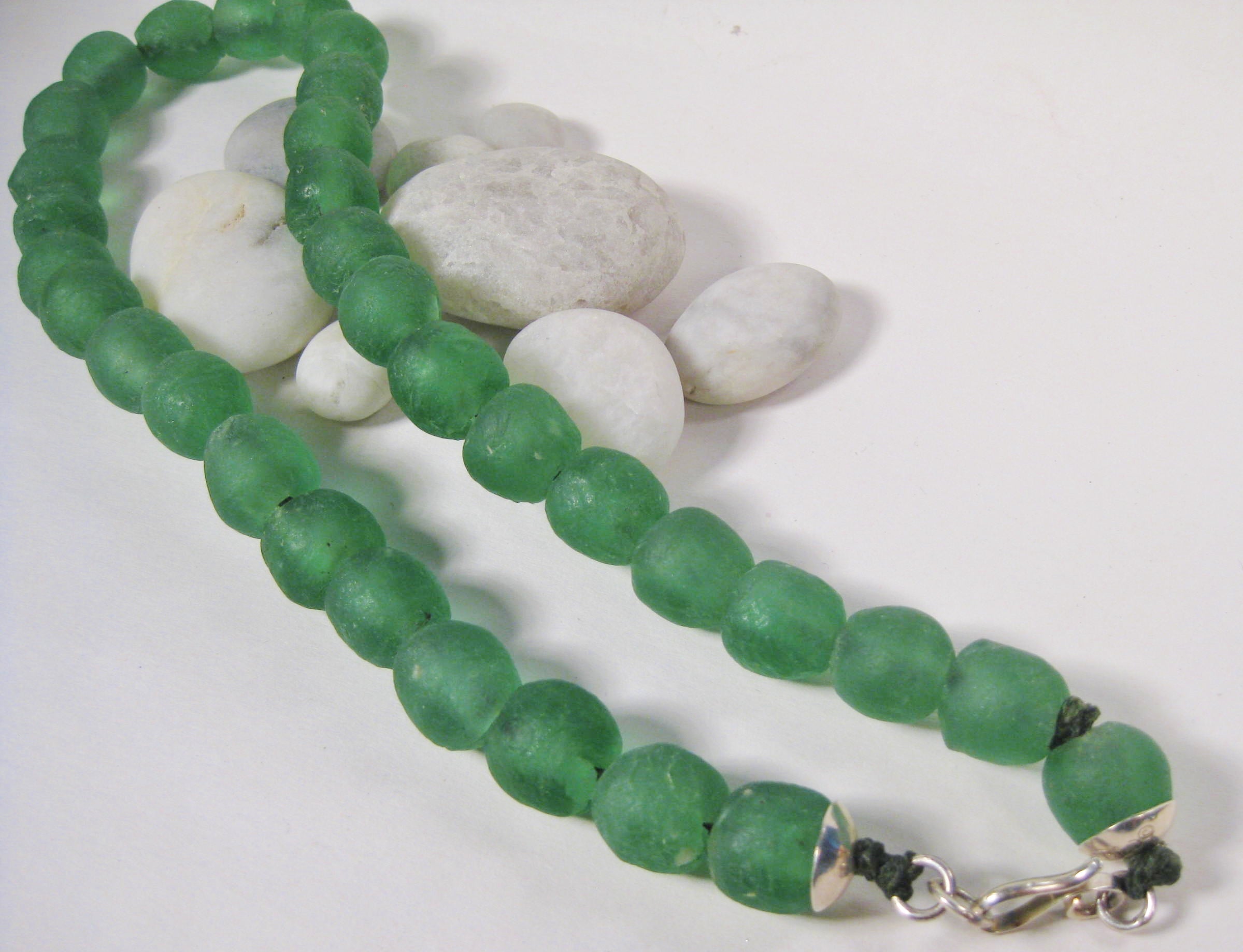 Green Glass Beads on Linen