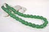 Green Glass Beads on Linen