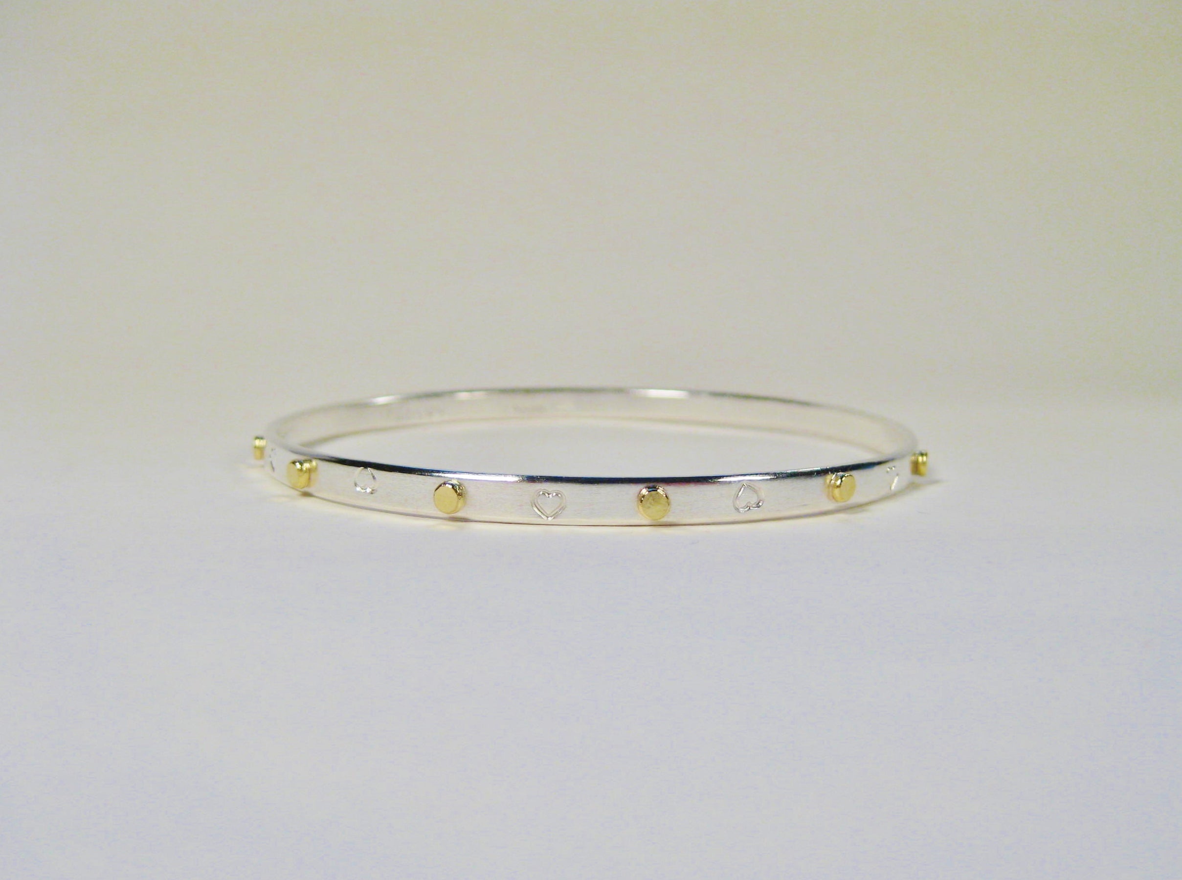 Sterling Silver Hand Stamped Heart Bangle with 18k Gold